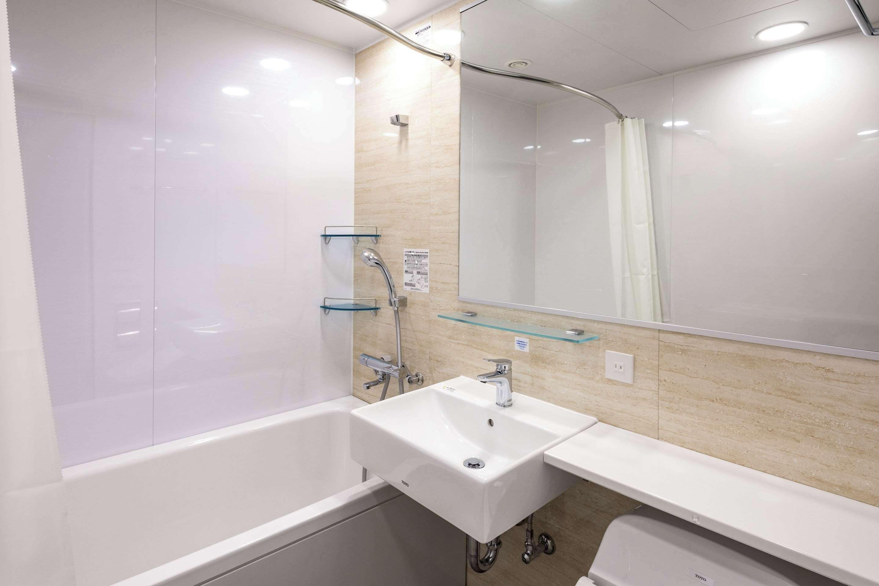 combined shower/bathtub, free toiletries, hair dryer, bathrobes