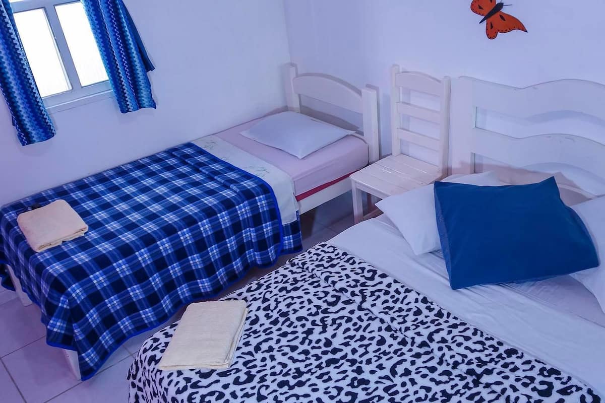 Blackout drapes, iron/ironing board, WiFi (free), bed sheets