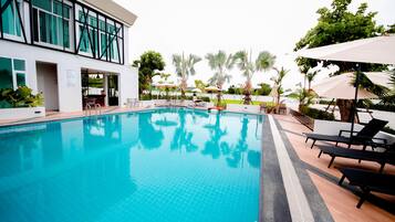 Outdoor pool, open 8:00 AM to 8:00 PM, pool umbrellas, sun loungers