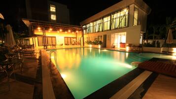 Outdoor pool, open 8:00 AM to 8:00 PM, pool umbrellas, sun loungers