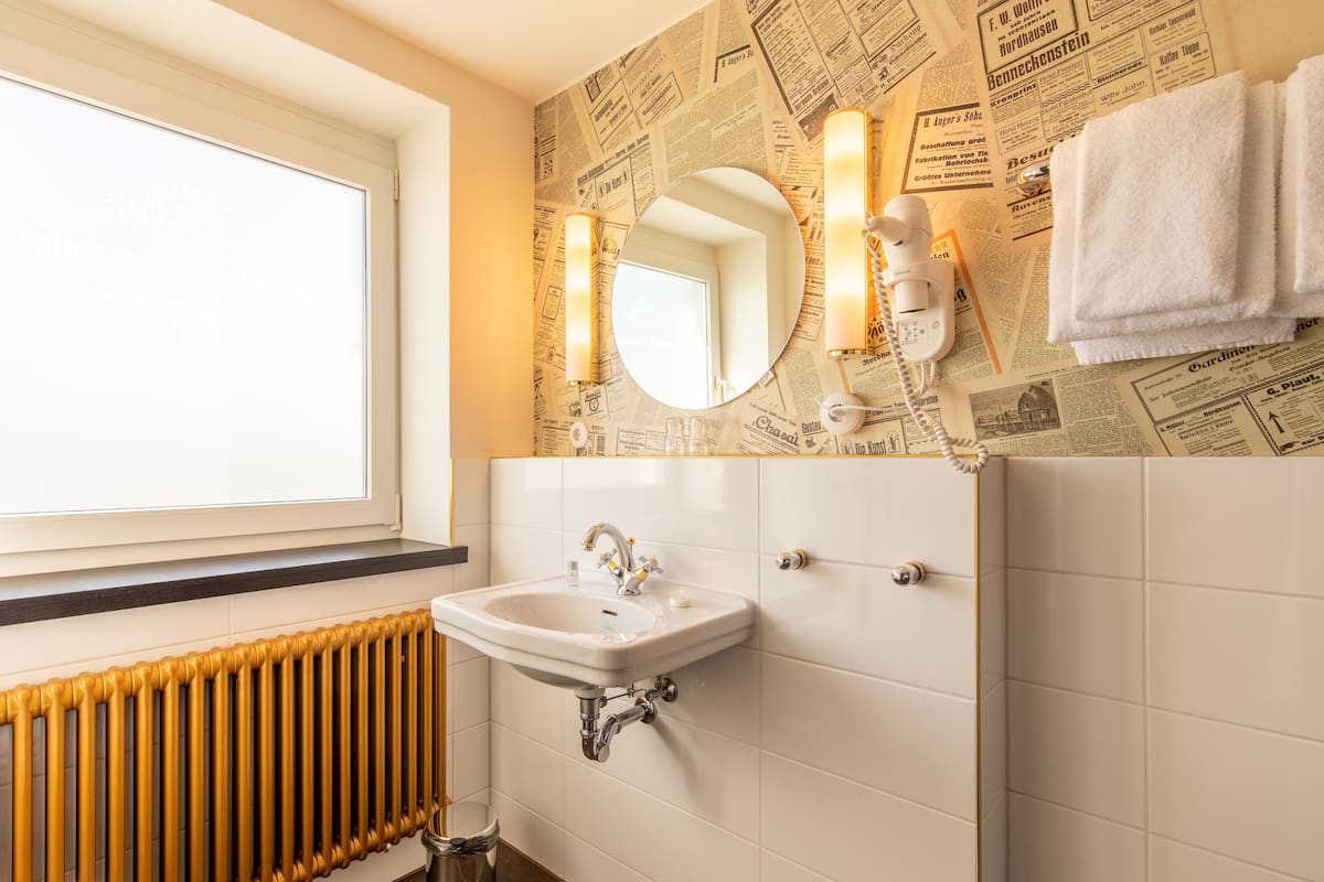 deep-soaking bathtub, free toiletries, hair dryer, slippers