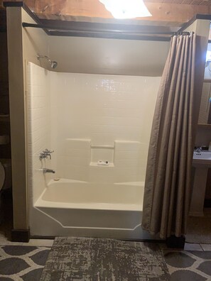 Unit A, King Suite | Bathroom | Shower, hair dryer, towels, soap - Log Cabin in the Field (Huntington)