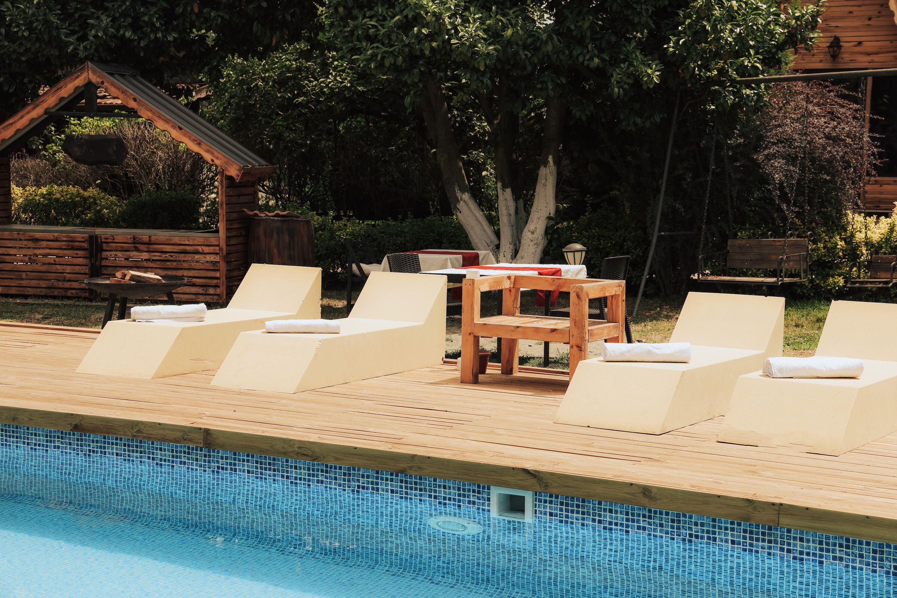 Outdoor pool, pool umbrellas, sun loungers