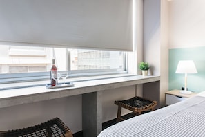 Deluxe fyrbäddsrum | Ljudisolering, strykjärn/strykbräda, gratis wi-fi och sängkläder
