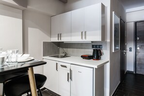 Deluxe-værelse til 4 personer | Privat køkken | Køleskab