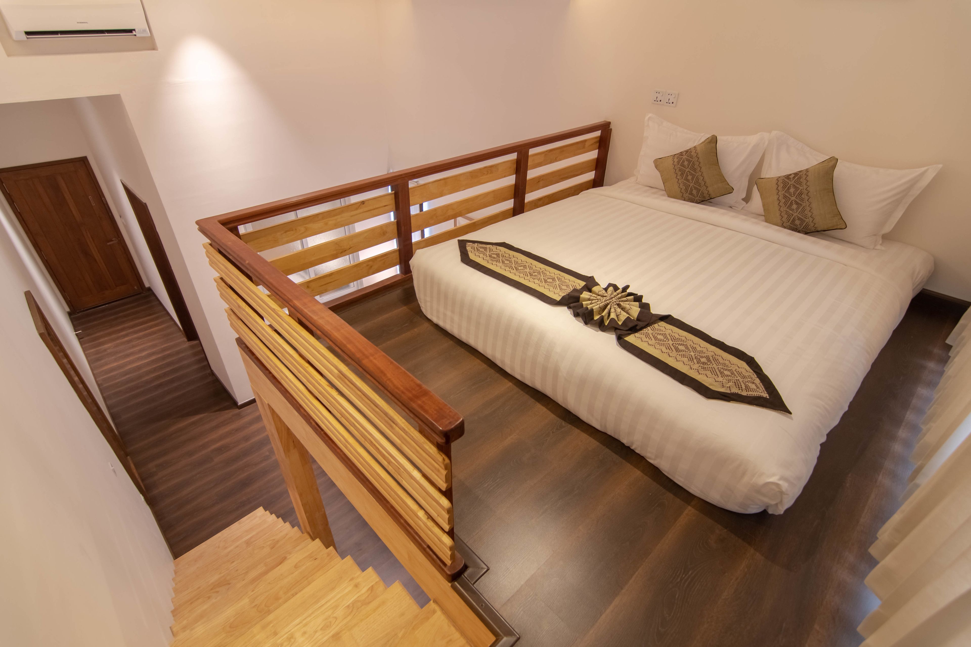 family room, city view | 1 bedroom, in-room safe, desk, laptop workspace