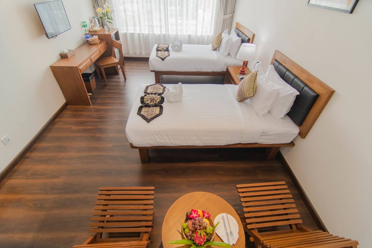 deluxe double or twin room, city view, poolside | 1 bedroom, in-room safe, desk, laptop workspace