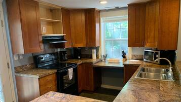 Krog Street Industrial loft | Private kitchen | Full-size fridge, microwave, oven, stovetop