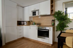 Apartamento, 3 quartos | Cozinha privada