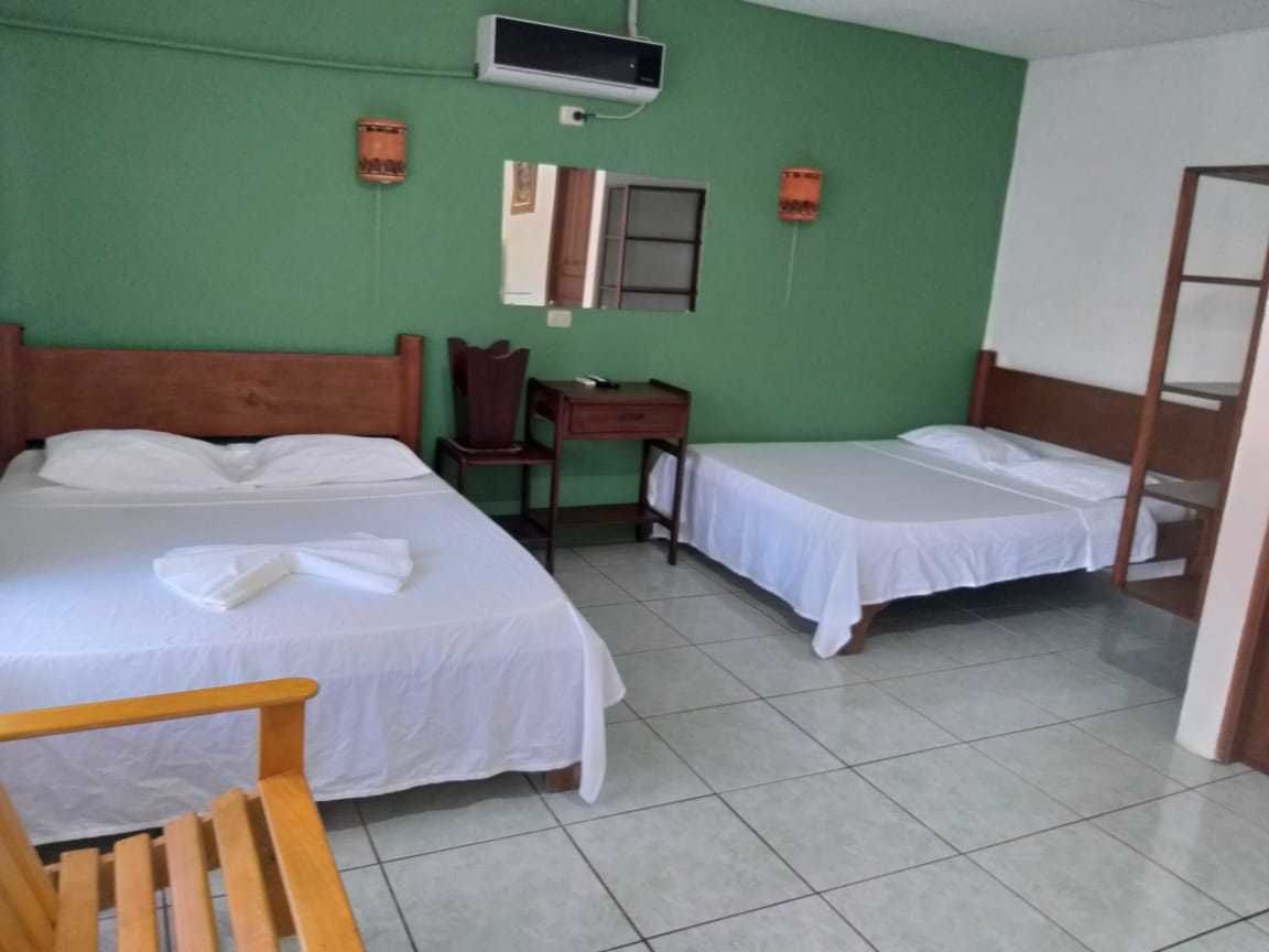 Family Room | Minibar, desk, free WiFi, bed sheets