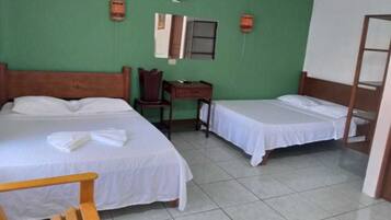 Family Room | Minibar, desk, free WiFi, bed sheets