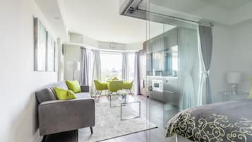 Premium Apartment, 1 Bedroom, Kitchen, City View | Living area | 43-inch flat-screen TV with digital channels, Smart TV, Netflix