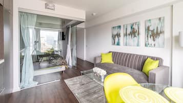 Premium Apartment, 1 Bedroom, Kitchen, City View | Living area | 43-inch flat-screen TV with digital channels, Smart TV, Netflix