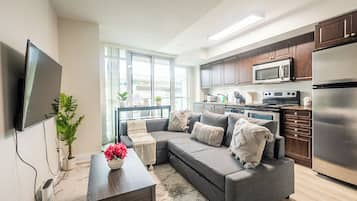 Appartement Exécutif, 1 chambre, balcon, vue ville | Coin séjour