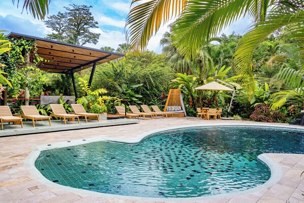 Outdoor pool, open 6:00 AM to 10:00 PM, pool loungers