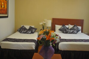 Family Room | Minibar, desk, blackout drapes, iron/ironing board - Terracota Suites (Xalapa)
