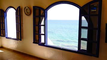 Basic Quadruple Room, Ocean View | 2 bedrooms, free WiFi, bed sheets
