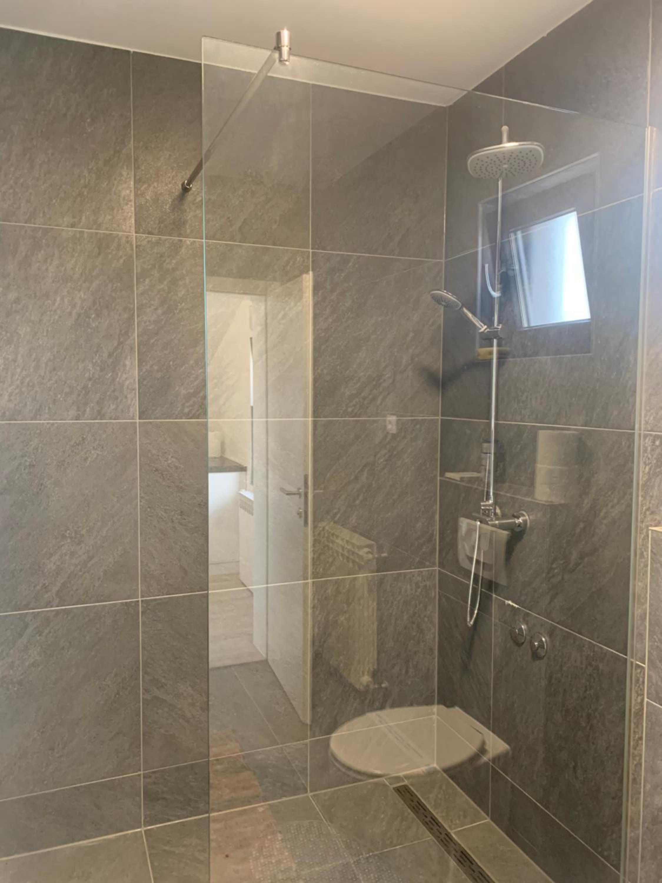 Shower, free toiletries, towels, soap