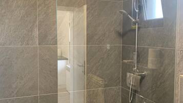 Shower, free toiletries, towels, soap