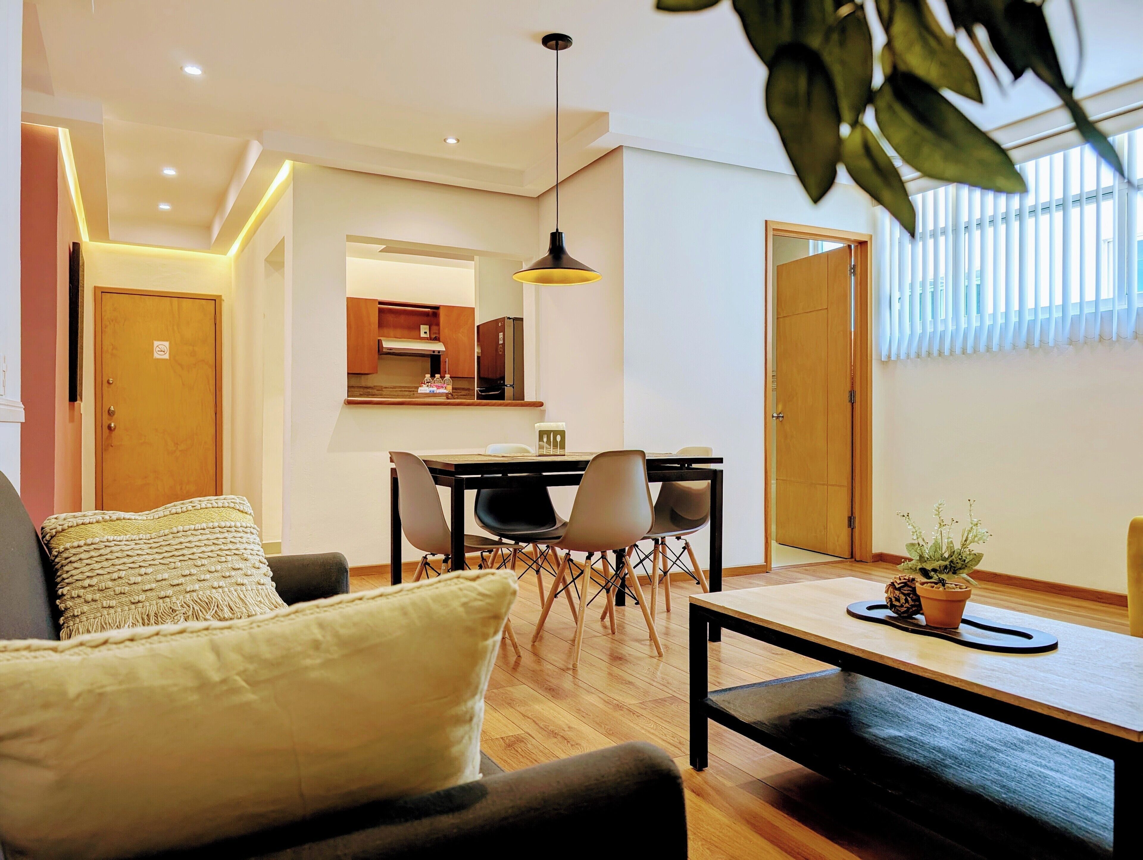 Apt 6, 2 bedrooms, 3 beds, 1.5 bath | Living area | 54-inch Smart TV with cable channels, TV, Netflix