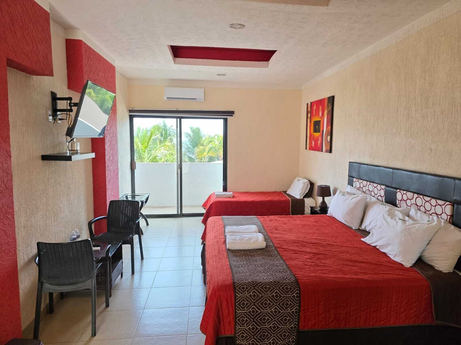 Habitación triple Deluxe | Cortinas opacas, wifi gratis, ropa de cama