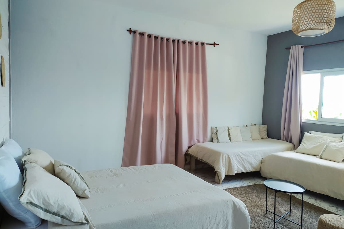 family room | in-room safe, laptop workspace, blackout curtains, free cots/infant beds