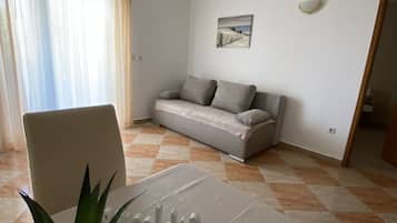Standard Apartment | Private kitchen | Full-sized fridge, stovetop, coffee/tea maker, toaster