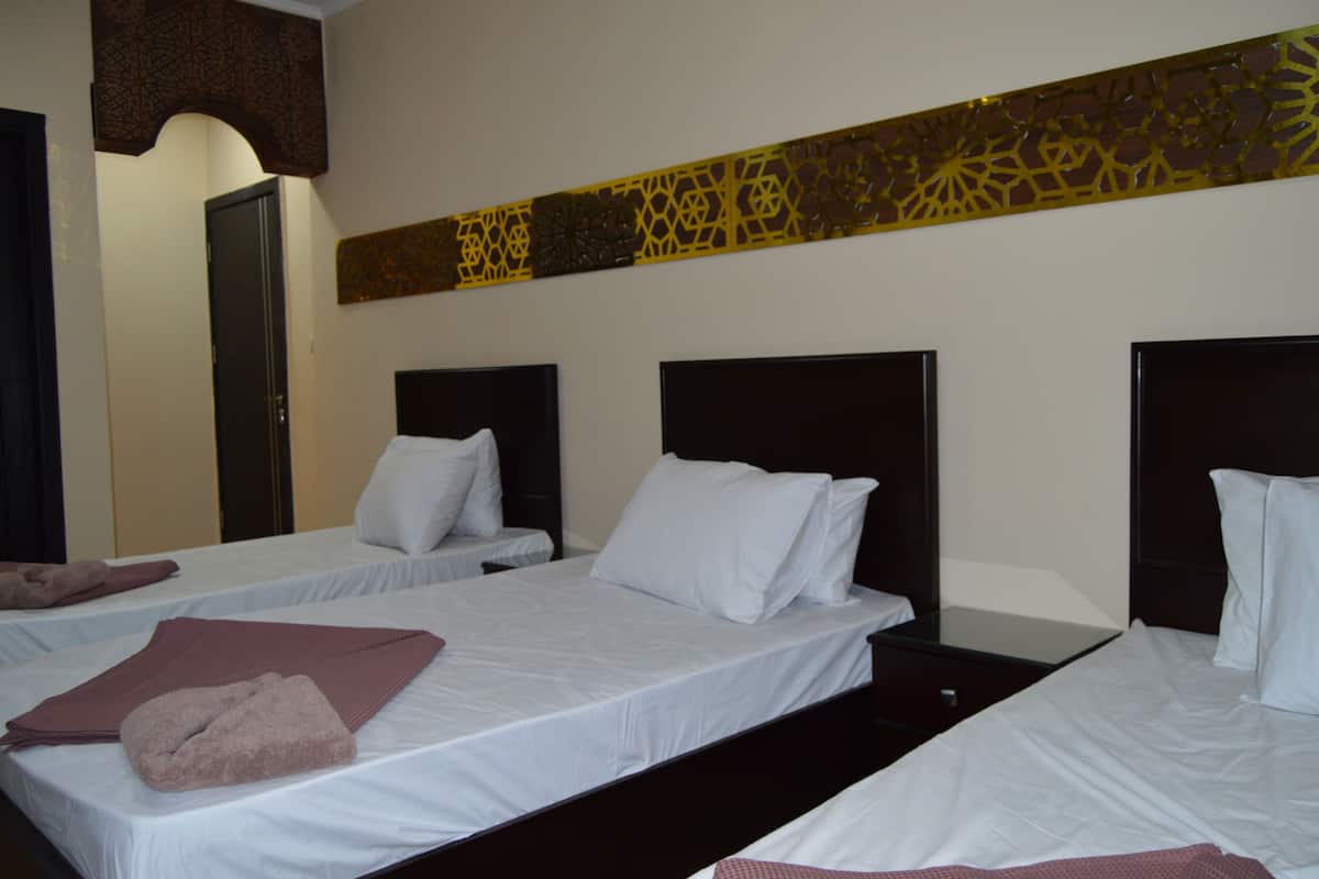 Deluxe Triple Room | Egyptian cotton sheets, premium bedding, down comforters