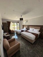 Family Room, Multiple Beds, River View | Premium bedding, minibar, desk, blackout drapes