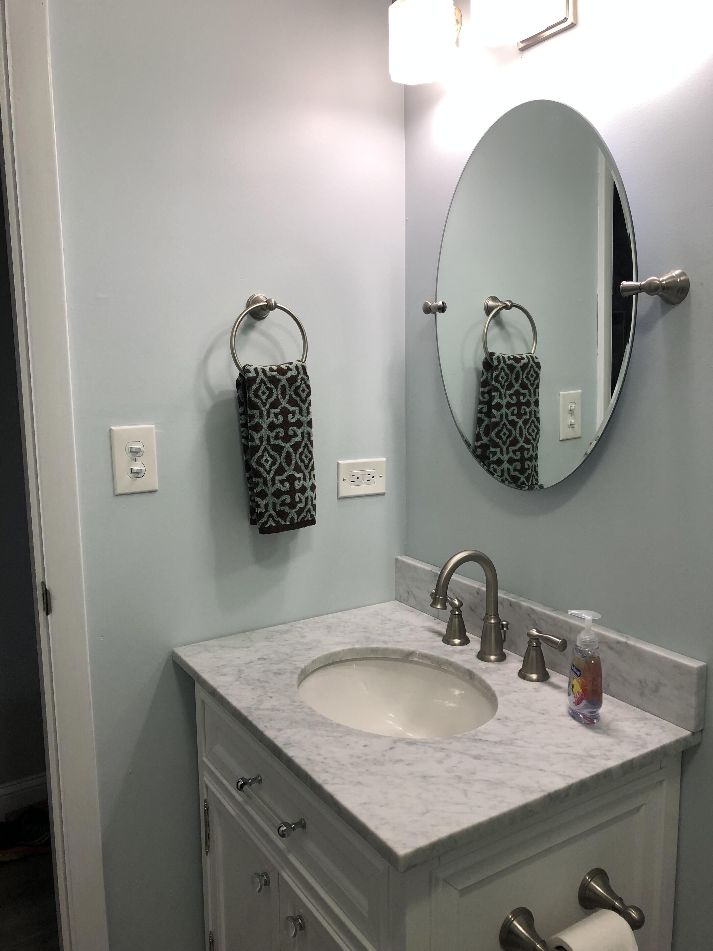 Shower, hair dryer, towels, toilet paper