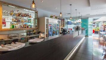 Breakfast, lunch, dinner served; local cuisine