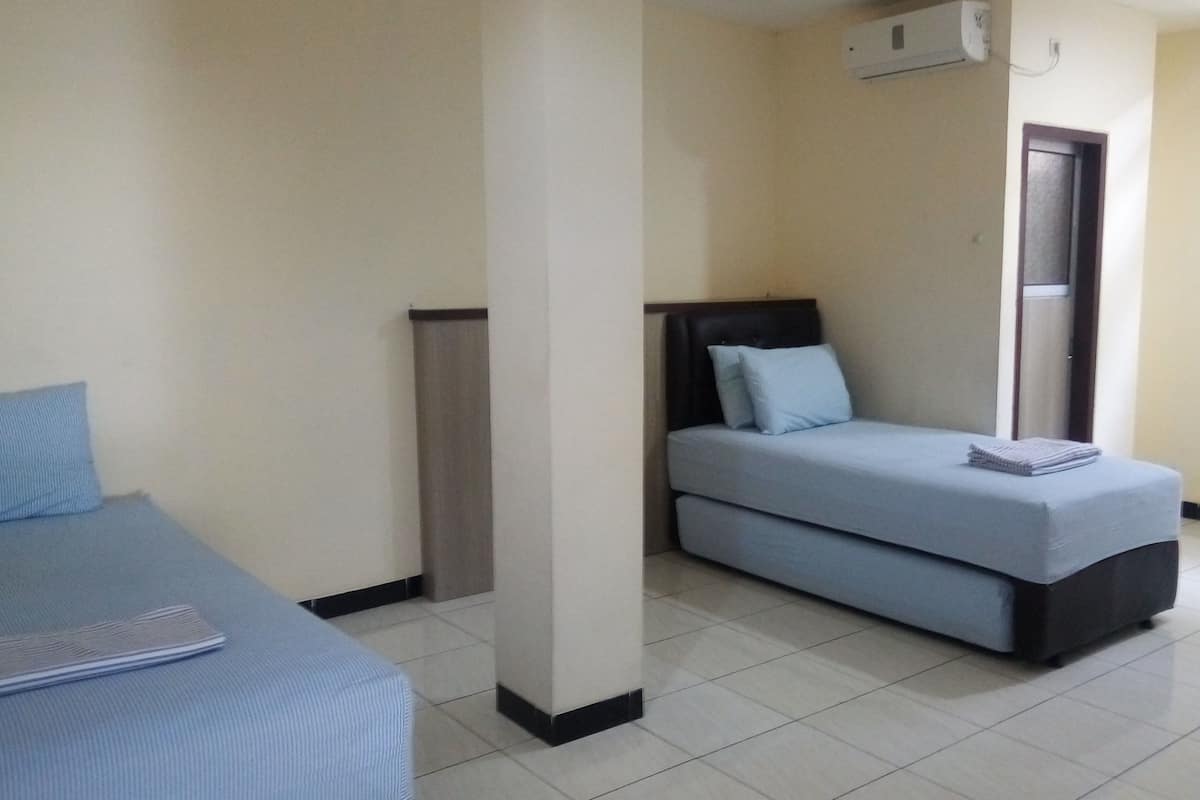 Economy driepersoonskamer | Extra bedden, gratis wifi, beddengoed