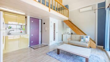 Duplex (202) | Living area | 42-inch flat-screen TV with satellite channels, TV