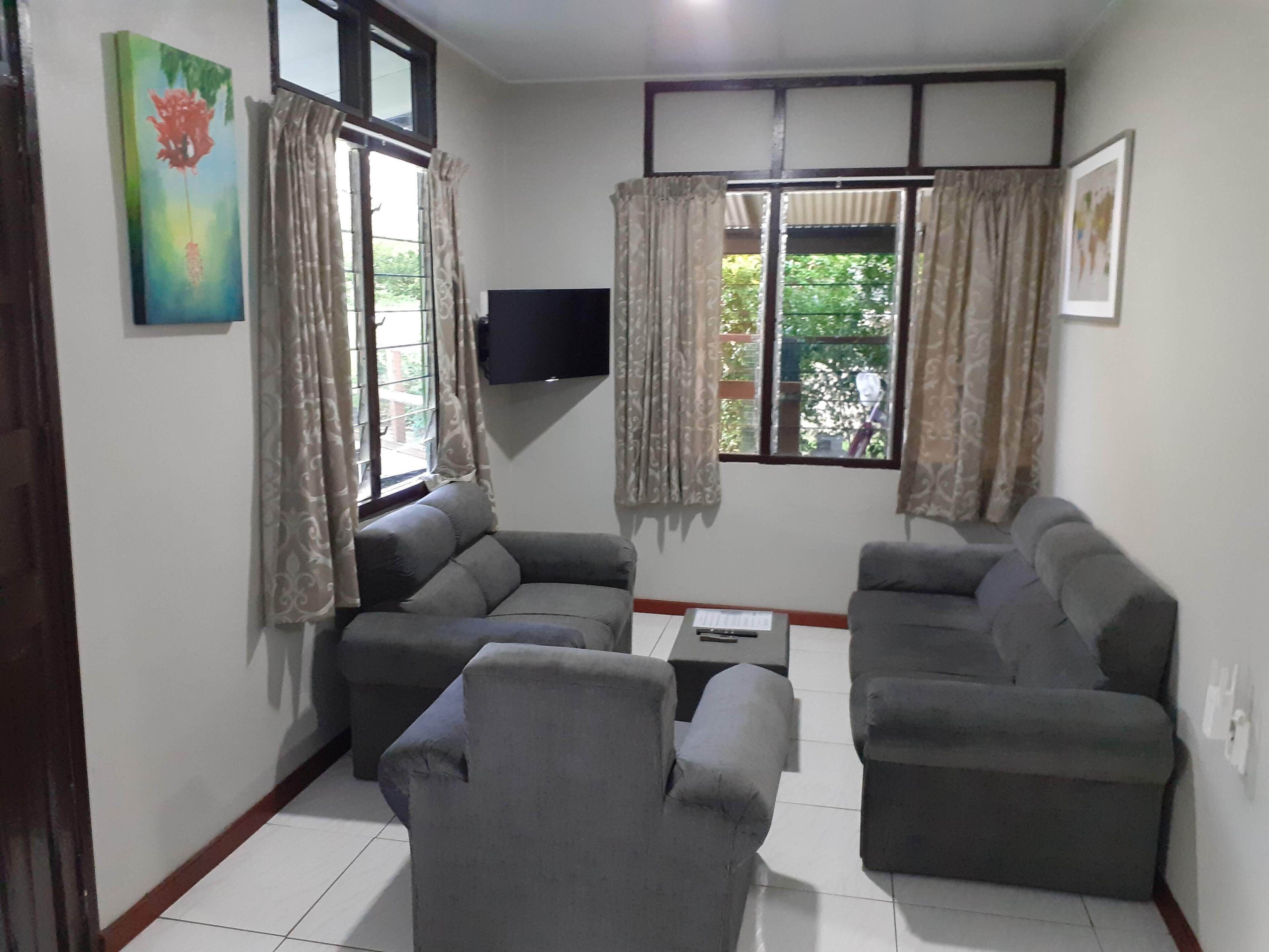 Family Apartment | Living area | Flat-screen TV