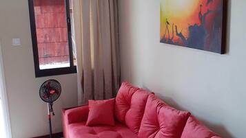 Luxury Apartment, 1 Double Bed, Non Smoking, Pool View | Pillow-top beds, individually decorated, individually furnished