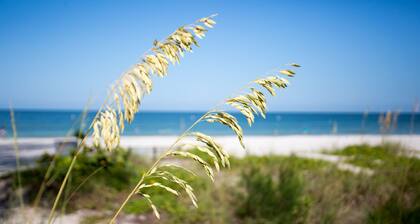 Just steps to the white sandy beach!