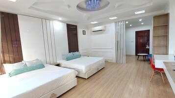 Familiestudio-suite | Premium-sengetøj, gratis minibar, individuelt design