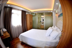 Quarto casal clássico, 1 cama Queen | Vista do quarto