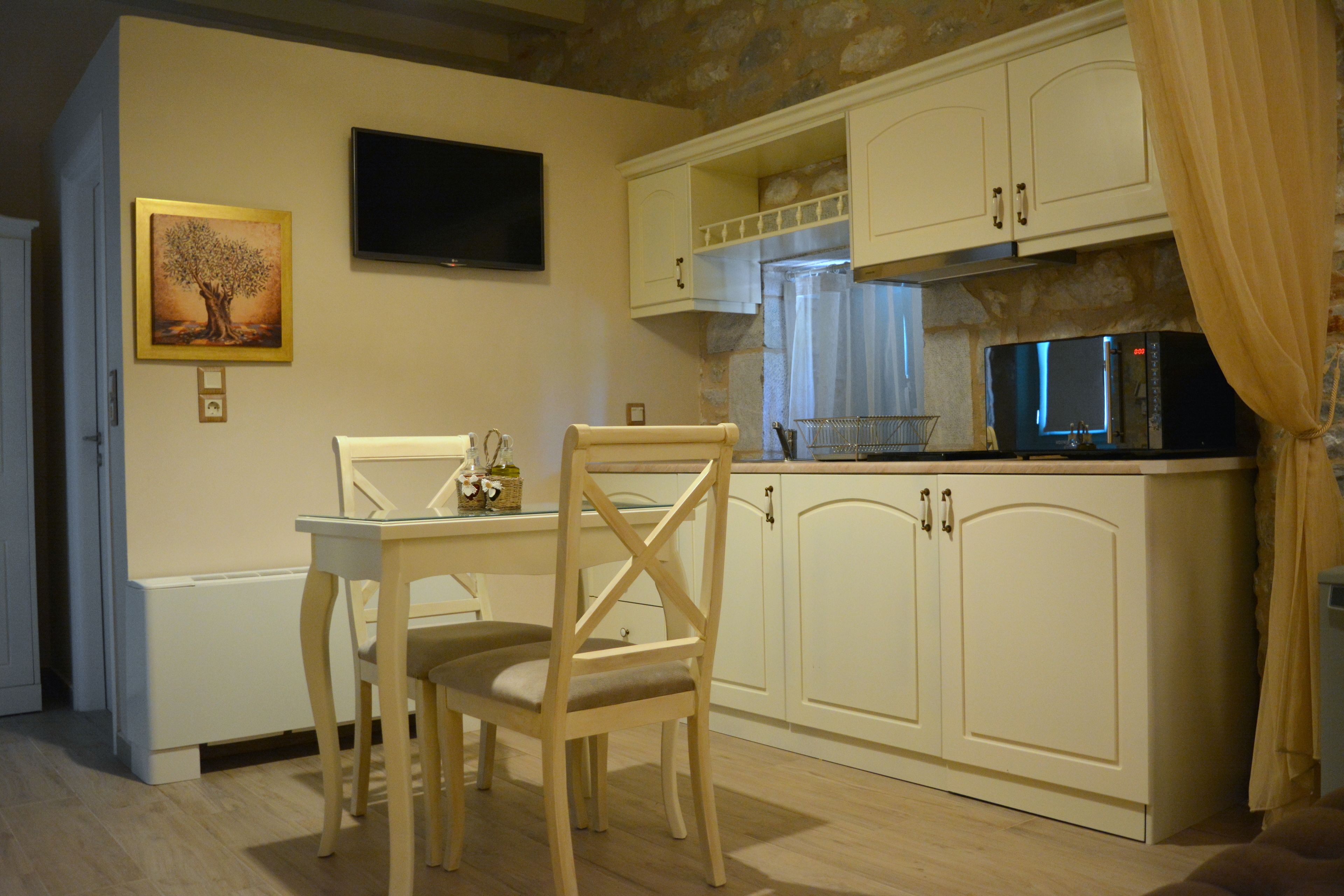 Deluxe Studio (Gaia) | Private kitchenette | Fridge, high chair
