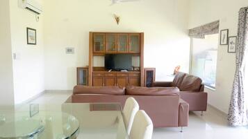 Deluxe Villa, 3 Bedrooms, Lake View | Living room | Flat-screen TV