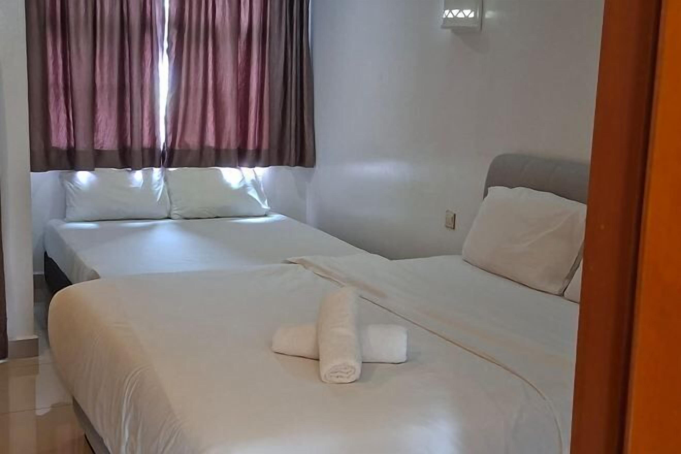 Desk, iron/ironing board, bed sheets