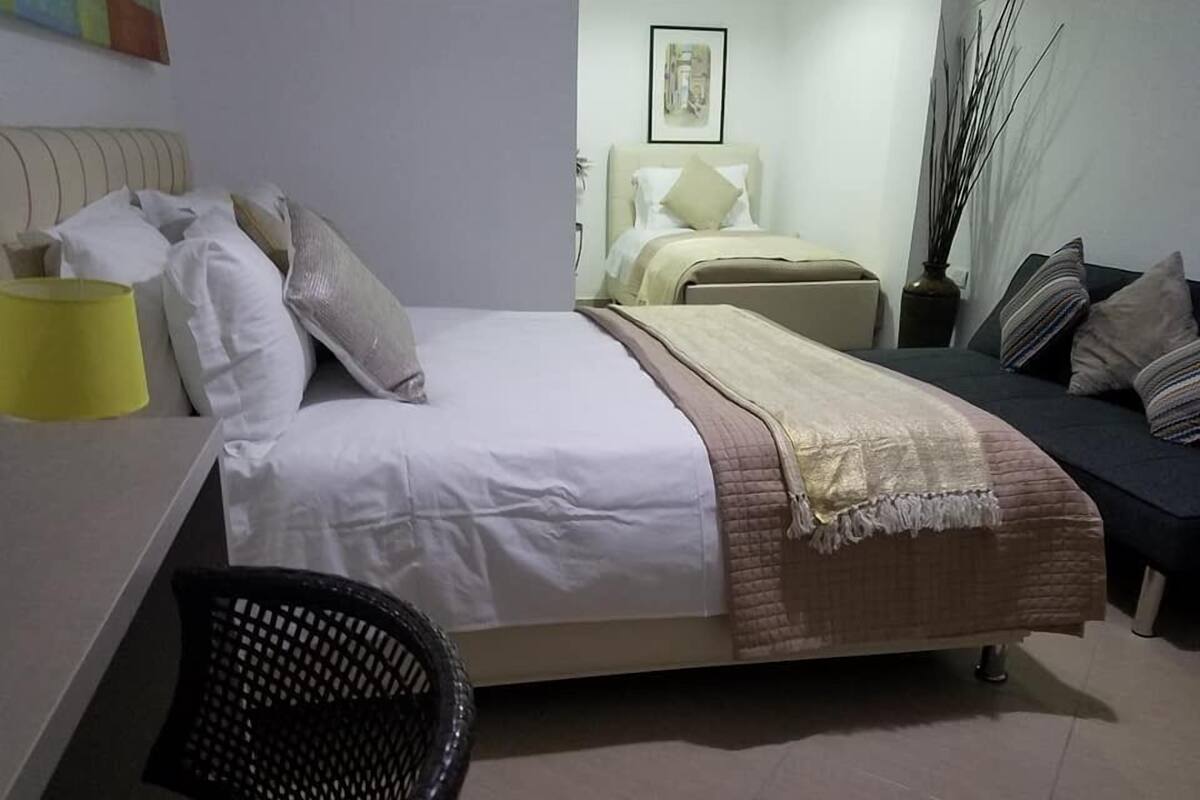 Family Triple Room, Sea View | Minibar, WiFi (free), bed sheets