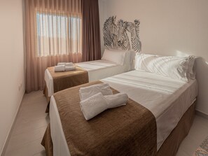 Departamento, 3 habitaciones | Cortinas blackout, wifi gratis y ropa de cama 