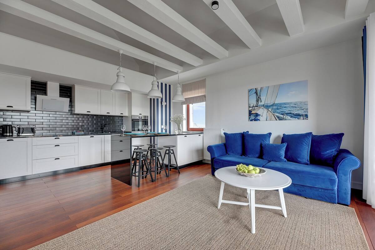 Superior Apartment, 2 Bedrooms, River View | Living area | 50-inch TV with cable channels