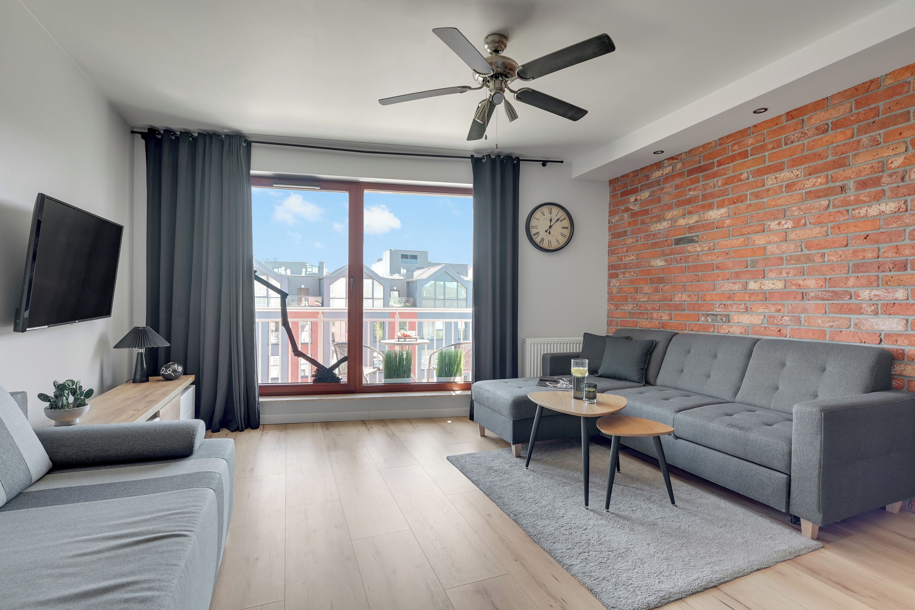 Superior Apartment, 1 Bedroom, Balcony, City View | Living area | 50-inch TV with cable channels