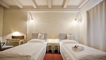 Comfort Twin Room | Select Comfort beds, in-room safe, desk, blackout curtains