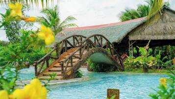 Outdoor pool, open 8:00 AM to 7:00 PM, pool umbrellas, pool loungers