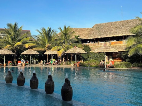 Outdoor pool, open 8:00 AM to 7:00 PM, pool umbrellas, pool loungers