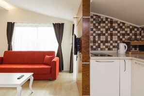 Apartment, 1 Bedroom | Living area | TV - Tema Lara Apart (Antalya)