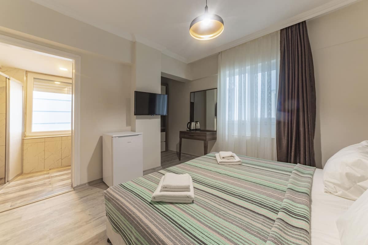 Standard Room | Premium bedding, minibar, blackout curtains, soundproofing